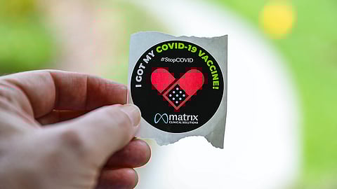 Image is attributed to Mick Haupt on Unsplash.