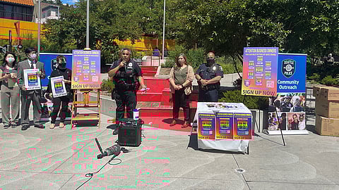 Interim SPD Chief Adrian Diaz, detective Beth Wareing, and LGBTQ liaison Dorian Koreio at Hing Hay Park. (Photo: Paul Kiefer)