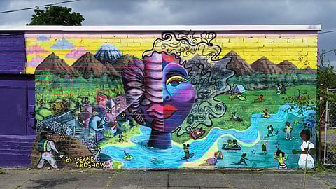 "Find Yourself Outside" is a new mural across from Flo Ware Park, a collaboration between AfroSPK and Perri Rhoden, both part of the Vivid Matter Collective. (Photo: Eddie Bauer)