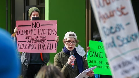Protesters call for protections for renters at a rally in Renton in February 2021. (Photo: Susan Fried)
