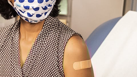 Photo of vaccinated patient courtesy of Centers for Disease Control via Unsplash.