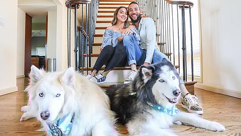 The Crawfords and their two dogs inside their Seattle home. (Photo: Alex Garland)