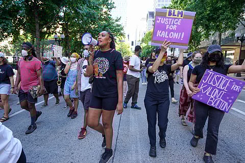 Ashley Paynter, @Decolonizingsci, helps lead a march through downtown Seattle following the #BreatheforKaloni rally on Saturday, July 24, 2021, at Westlake Park. The rally and march were followed by a vigil. (Photo: Susan Fried)