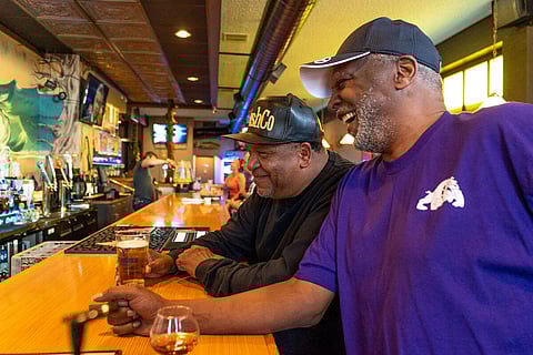 Friends Bernard and Mel, regulars at the Beachcomber, say they probably spend too much time there but are very happy that they can now sit at the bar and watch games and hang out together like they did pre-pandemic.
(Photo: Susan Fried)