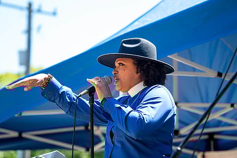 Bishop Janice Davis Lee, a member of New Hope Missionary Baptist Church, speaks about the history of the land the City of Seattle took from the church through an urban renewal program and why it's time to get it back during the Rally for African American Reparations: Return the Land and Resources to Our Black and Brown People on Saturday, July 24, at the Spruce Street Mini Park across the street from New Hope Missionary Baptist Church. (Photo: Susan Fried)