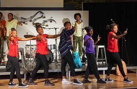 The cast of "Story of an Off-Brand Band" rehearse at the Acts on Stage Theatre on Wednesday, July 21, 2021.(Photo: Susan Fried)