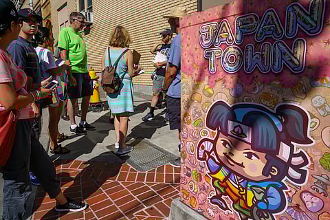 Enfu switching box art with Japantown signage. (Photo: Alan Alabastro Photography, courtesy of Hai! Japantown)
Alternative Caption:
The Japantown Box designates Seattle's historic Nihonmachi, or Japantown. The Japanese Remembrance Tour connects sites of the bustling area before the unjust forced incarceration of Japanese Americans in 1942 under Executive Order 9066. (Photo: Alan Alabastro Photography)