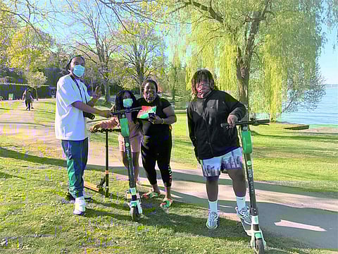 Ditch the car, and enjoy neighborhood greenways by biking, scooting, or rolling this summer. (Photo: Susan Gleason)