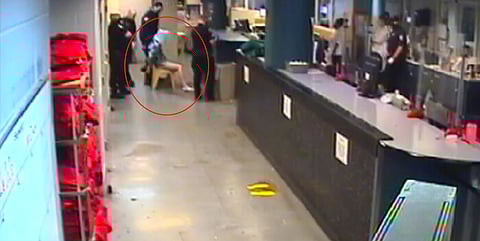 DAJD Claims Protester Slammed Own Face Onto Booking Counter, Breaking Two Teeth