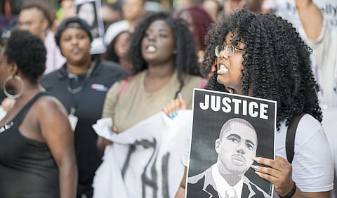 Thurman Blevins "Please don't shoot me!" March in Minneapolis, Minnesota. Photo is attributed to Fibonacci Blue (under a Creative Commons, CC BY 2.0 license).