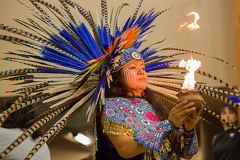 Ixtli Salinas-White Hawk performs the only ceremony the Aztec culture is allowed to share with those outside the culture, during the fifth annual celebration of Indigenous People's Day at Daybreak Star Indian Cultural Center in Seattle, Washington, on Oct. 8, 2018. She belongs to Tloke Nahuake- tlayolohtli, a traditional Aztec Dance family group. (Photo: Carolyn Bick)