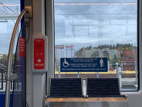 Seattle Councilmember Tammy Morales and State Sen. Rebecca Saldaa participate in the "Week Without Driving," riding Seattle Metro buses and the Link Light Rail, including along the new route that connects the University District to downtown. Photo courtesy of Real Change News.