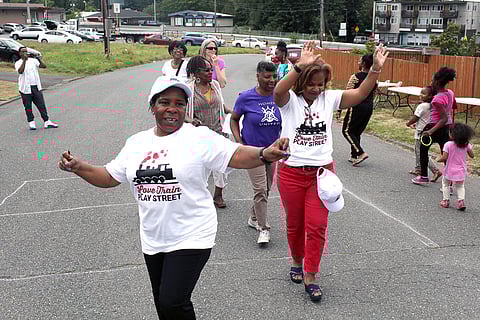 Alesia Cannady leads the 2017 Love Train March near her home in Skyway. (Photo: Matt Mills McKnight)
