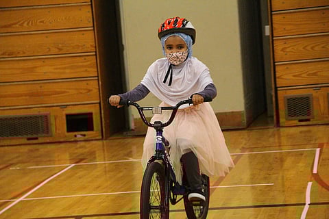A Louisa Boren STEM K–8 elementary school student at their first bike safety lesson. (Photo: Teresa Scribner, SPS)