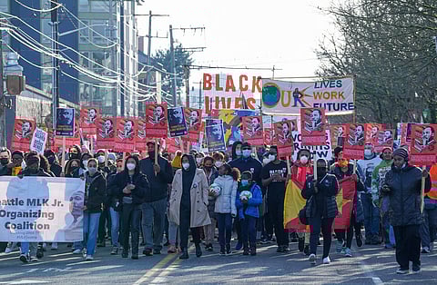 Hundreds of marchers hit the street to honor the late civil rights leader Rev. Dr. Martin Luther King Jr. during the 40th Annual MLK Jr. Day March from Garfield High School on Jan. 17, 2022. (Photo: Susan Fried)