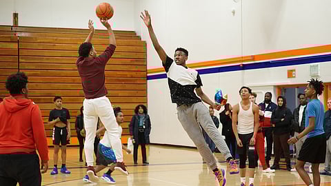 Rainier Beach High School (RBHS) students play in a 2019 pick-up game in the RBHS gymnasium. (Photo: Susan Fried)