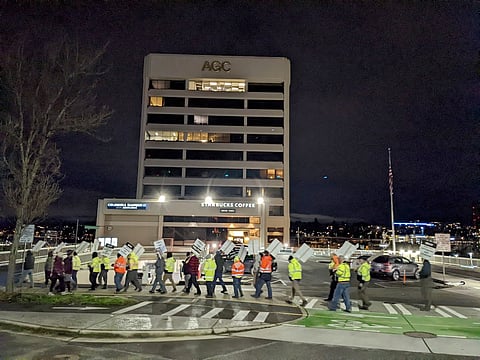 Teamsters took action in downtown Seattle at the headquarters of the Washington chapter of the Associated General Contractors (AGC) industry association in Jan. 2022. Photo courtesy of Teamsters Local 174.