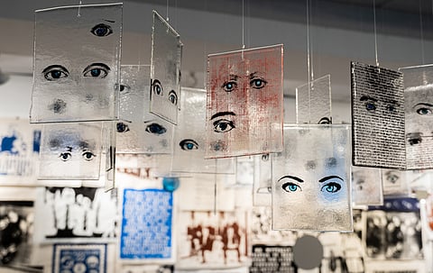 Christina Reed's "Regard: White Gaze" uses glass elements to encourage viewers to reflect on their own experiences with race. (Photo: Ronnie Estoque)