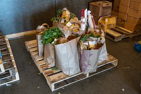 Grocery bags at Rainier Valley Food Bank (RVFB) await delivery to local community members. (Photo: Ronnie Estoque)