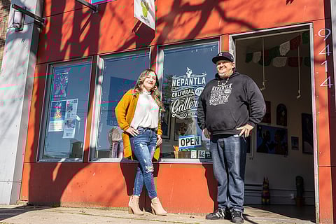 Judy Avitia-Gonzalez (left) and Jake Prendez (right) in front of Nepantla Cultural Arts Gallery in White Center. (Photo: Ronnie Estoque)
