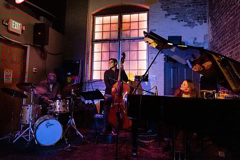 Trio Marina Albero (piano), Trevor Ford (bass), and D'Vonne Lewis (drums) performing at a Fellowship Wednesday last year at Vermilion Art Gallery and Bar. Fellowship Wednesday ran last year from mid-October of 2021 to February 2022, and is returning with a new format. It now runs in six-week seasons: summer, spring, fall, and winter. (Photo: Jim Levitt)