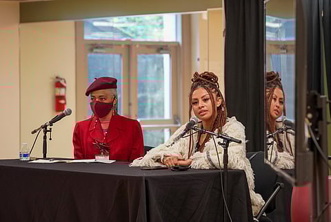After being introduced by artist Esther Ervin (left), artist Stephanie Morales (right) gave a talk at ACES about how her Afro-Latina and Filipino background — as well as interest in travel, social justice, and multiculturalism —  influences her work. (Photo: Susan Fried)