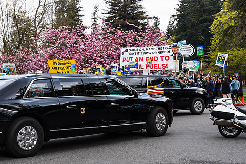 President Biden arrives at Seward Park in the Cadillac One and is greeted by Ship It Zero activists. (Photo: Ronnie Estoque)