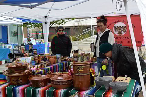 Beacon Arts street fair visitors check out Laura Bautista's earthenware at her shop Artesanias De Barro La Mexicana. (Photo: Patheresa Wells)