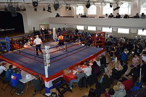 The community gathered to support amateur boxers in the first ever Bumblebee Memorial Boxing Showcase, in honor of the late Willie Briscoray, known as Coach Bumblebee. The event took place on April 16, 2022, at Washington Hall. (Photo: Patheresa Wells)