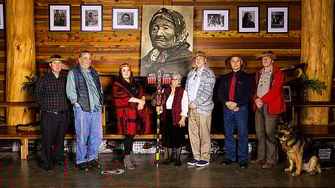 The Duwamish Tribal Council gather at the Longhouse on West Marginal Way, in front of a portrait of Kikisoblu, the daughter of Chief Sealth. From Left: Roger Boddy, James Rasmussen, Desiree Fagan, Council Chair Cecile Hansen, Paul Nelson, Ken Workman, and John Boddy. Councilmembers not pictured are Cindy Williams and Russell Beard.
