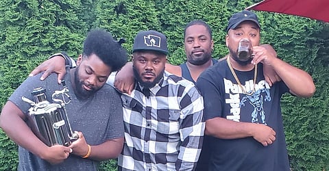 Brothers (left to right) James Dixon, David Dixon, Matt Dixon, and Mario Savage have roots in the Central District, right where they're opening up their new bottle shop at 23rd and Jackson. Photo courtesy of 23rd Ave Brewery.