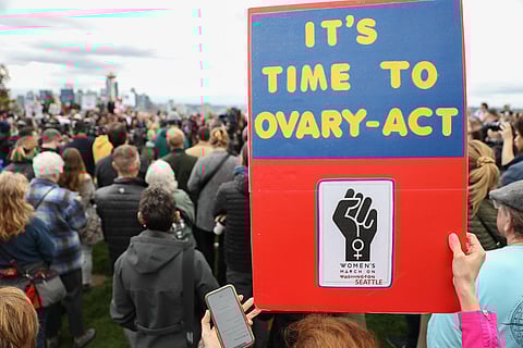 Among the calls to action at Kerry Park on Tuesday, May 3, 2022. (Photo: Alex Garland)