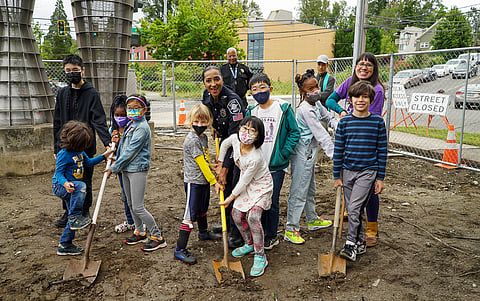 Detective Denise "Cookie" Bouldin and youth members of the chess club break ground on the Detective Cookie Chess Park Sunday, June 12, 2022. (Photo: Susan Fried)