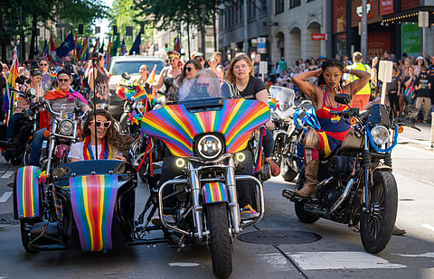 Seattle Pride's Women's Motorcycle Contingent (Dykes that Ride) lead the 46th annual Seattle Pride Parade down 4th Avenue. (Photo: Susan Fried)