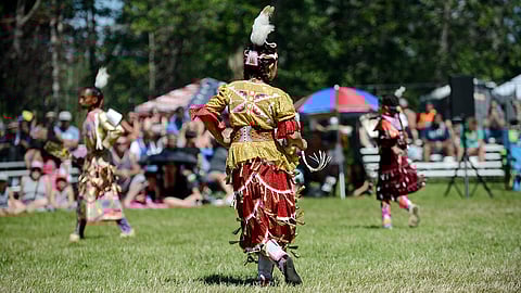 Girl dancing the Jingle Dance at Seafair Indian Days Powwow. (Photo: Jack Storms)