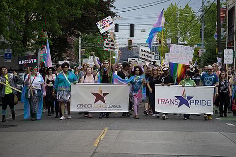 Participants from the 2018 Trans Pride Seattle march with signs and banners. (Photo: Andie Deroux, courtesy Gender Justice League)