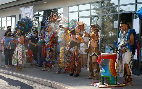 Dance by Mitotilistli Centeotl and Apantecatl Chalchitlicue of Danza Azteca during Casa Latina open house ceremony on July 27. (Photo: JoJo Nieves)