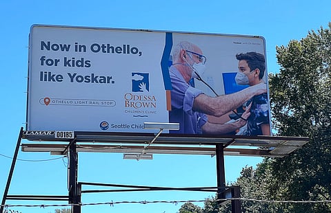 Billboards located in South Seattle advertising the opening of the Seattle Children's Odessa Brown Children's Clinic in Othello showed a white man examining a young boy named Yoskar. (Photo: Bobbi Nodell/WSNA)