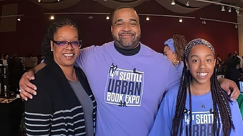 Jeffrey Lee Cheatham II (center), founder of Seattle Urban Book Expo, pictured with his mom, Amanda, and daughter, Josilyn, at the fourth book expo in 2019. (Photo courtesy of Nikki Etienne)