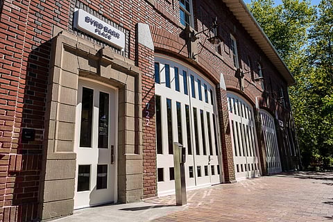 Photo depicting the brick exterior firehouse exterior of Byrd Barr Place.
