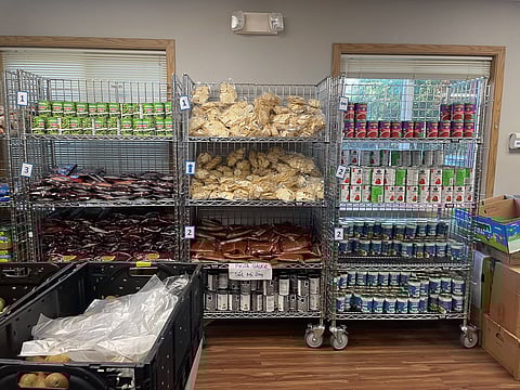 The White Center Food Bank uses a grocery store model and allows customers to pick up food from shelves. (Photo: Jadenne Radoc Cabahug)