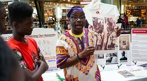 Delbert Richardson teaching a group of students from his "American History Traveling Museum" during the 2017 Festival Sundiata. (Photo: Susan Fried)