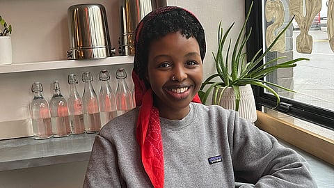 Somali chef and writer Ifrah Ahmed at her traveling pop-up, Milk & Myrrh, currently being hosted at Karachi Cowboys in Capitol Hill. (Photo: Nura Ahmed)