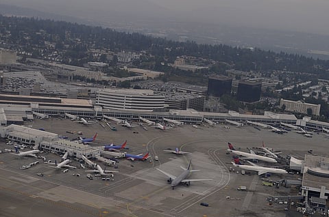 Seattle-Tacoma International Airport, SeaTac, Washington, as seen from the air. Photo is attributed to Joe Mabel (under a Creative Commons, CC BY-SA 3.0 license).