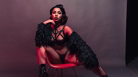 Lou Lou la Douchesse de Riere, an Indigqueer burlesque dancer poses for a picture. De Riere, whose name translates to "The Duchess Of Ass," is coming to Seattle for a one-night-only performance at DigniTEASE (Photo: Carl Theirault)