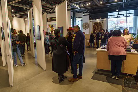 People gather at the "Embrace Equity" exhibition reception event in Gallery Onyx at Midtown Square, March 7, 2023. Onyx Fine Arts Collective will host a closing reception on April 22 featuring the African-American Writers Alliance. (Photo: Jay Taylor Photography)
