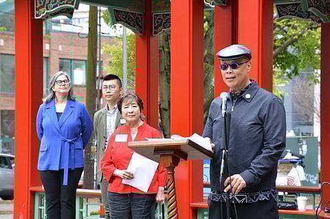 Wing Luke Museum Executive Director Jol Barraquiel Tan speaks at the press conference on May 9, along with Betty Lau, Huy Pham, and Katherine Malone-France. (Photo: Chetanya Robinson)
