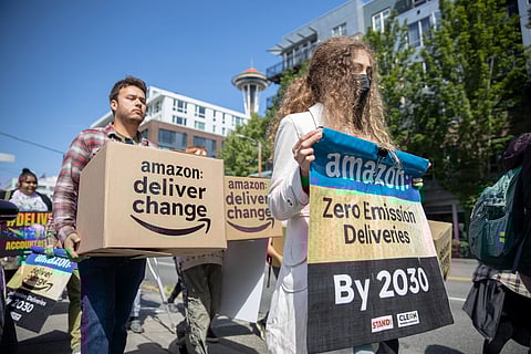 Youth climate activists march to Amazon HQ demanding faster action on changing deliveries to zero emissions. (Photo: Alex Garland)