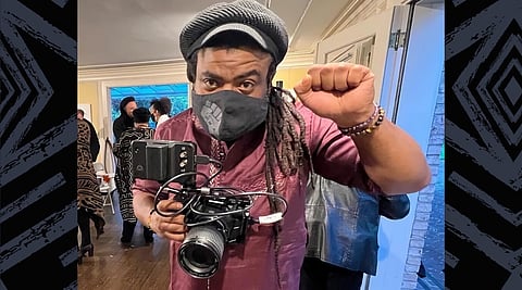 Anthony Tackett filming at an event for Black mothers. (Photo courtesy of Anthony Tackett)