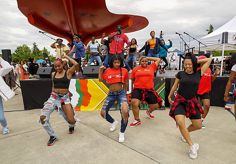 The Kutt'N'Up dance team performs during the Africatown Juneteenth Festival, June 19, 2022, at Jimi Hendrix Park. (Photo: Susan Fried)